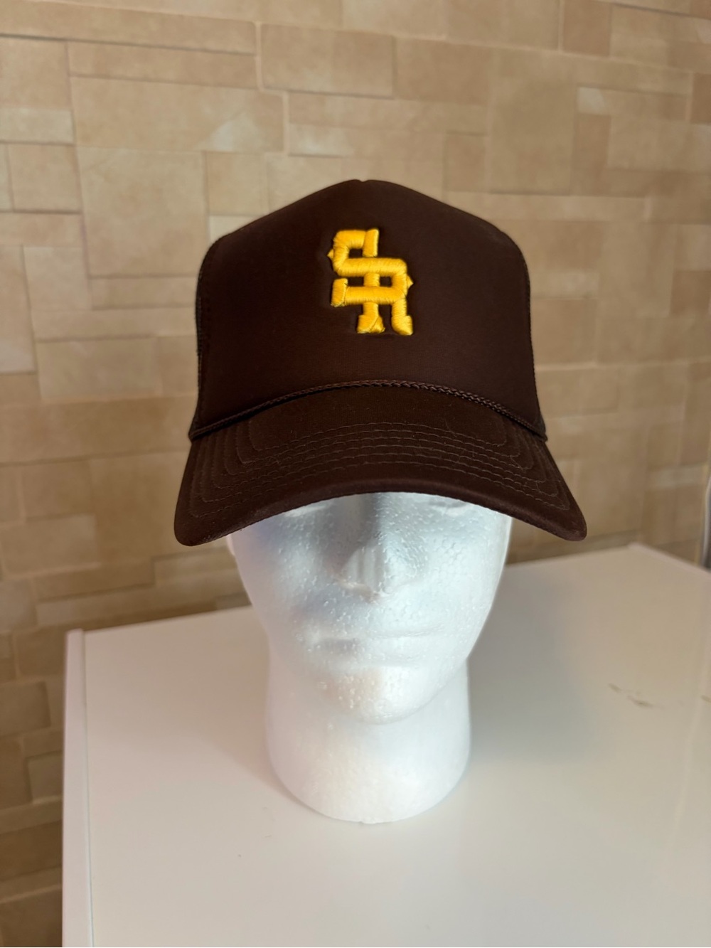 Stevenson Ranch Brown Trucker Hat with Yellow Embroidered Logo